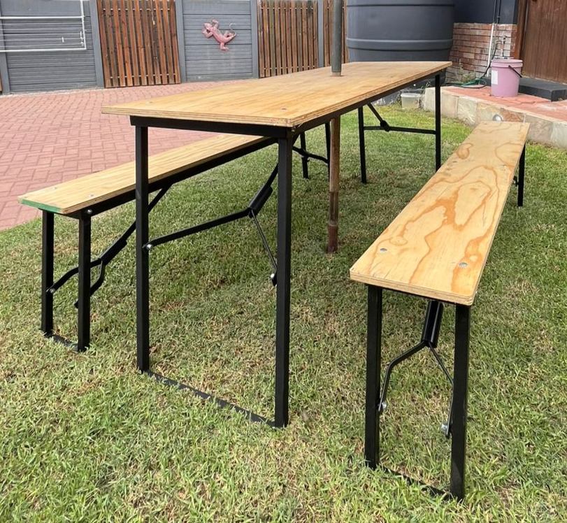 Outdoor wooden table and matching benches