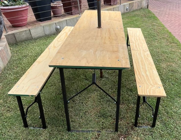 Wooden benches and table with black metal frames
